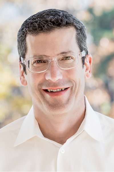 headshot of Eric Mansell, M.D., Ph.D.
